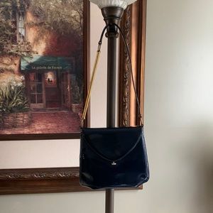 Bonwit Teller vintage blue patent purse with gold bar strap